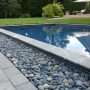 Install Pebble Sheen Blue Granite in Pool in This Way